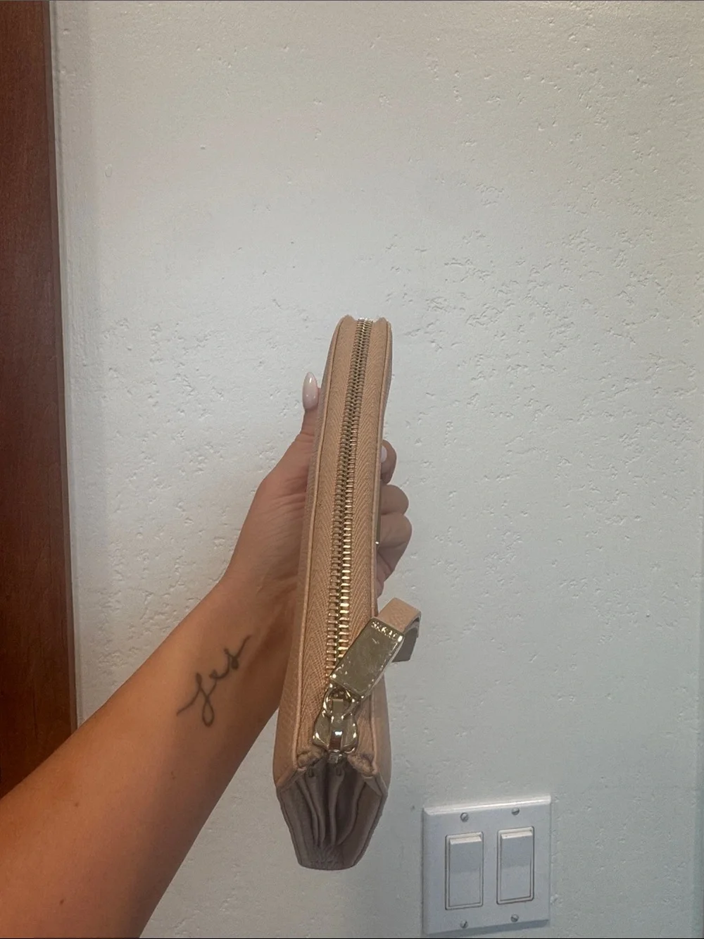 TOD'S Blush Beige Zip Wallet with Tassel Pull